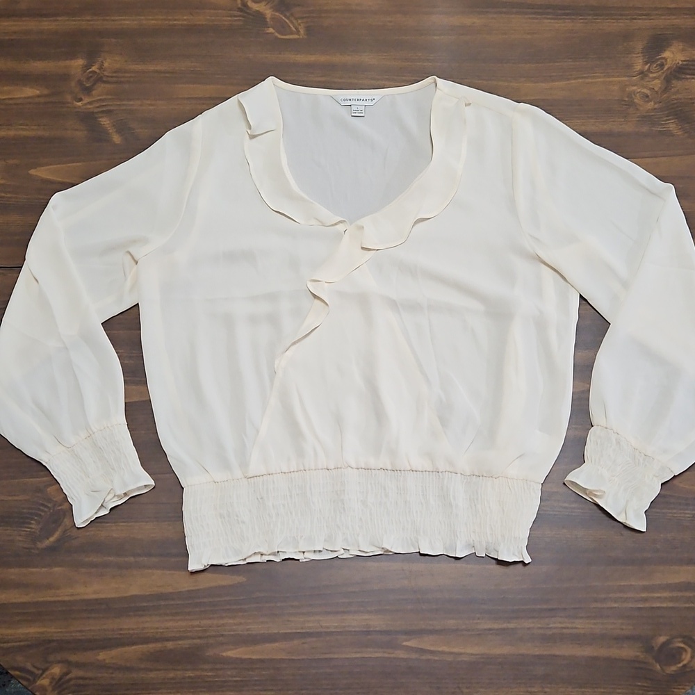 Counterparts Cream Ruffle Blouse
